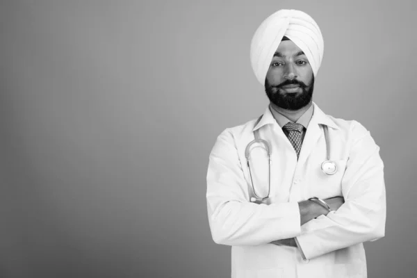 Studio Shot Young Handsome Bearded Indian Sikh Man Doctor Gray — Foto de Stock