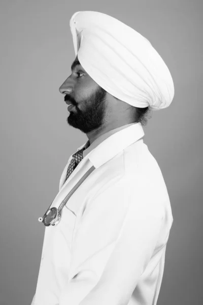 Studio Shot Young Handsome Bearded Indian Sikh Man Doctor Gray — Fotografia de Stock