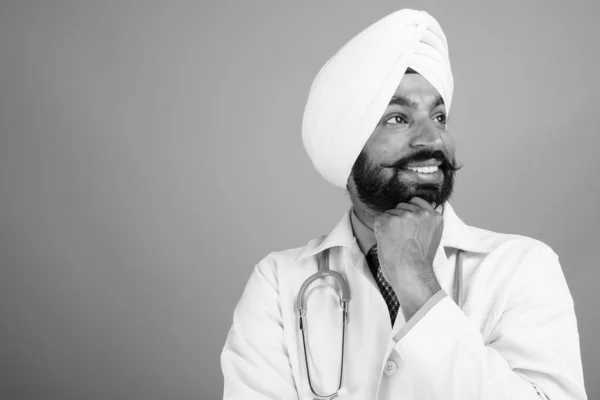 Studio Shot Young Handsome Bearded Indian Sikh Man Doctor Gray — Fotografia de Stock