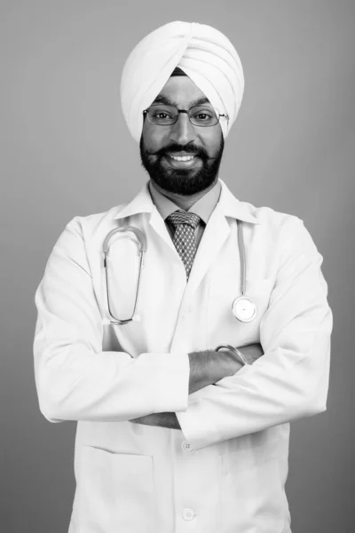 Studio Shot Young Handsome Bearded Indian Sikh Man Doctor Gray — Fotografia de Stock