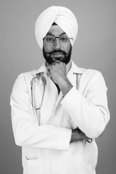 Studio Shot Young Handsome Bearded Indian Sikh Man Doctor Gray — Fotografia de Stock