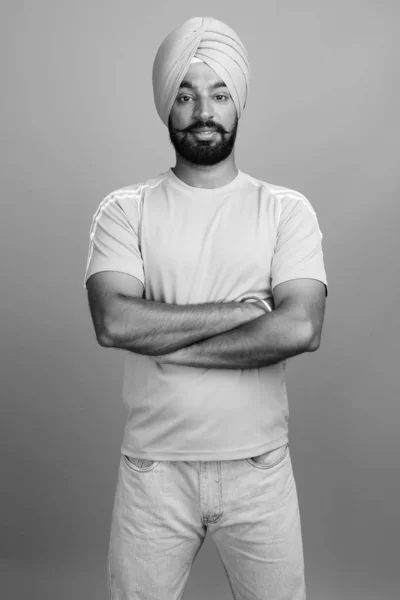 Studio Shot Young Handsome Bearded Indian Sikh Man Wearing Turban — Fotografia de Stock