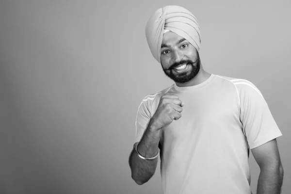 Studio Shot Young Handsome Bearded Indian Sikh Man Wearing Turban — Fotografia de Stock