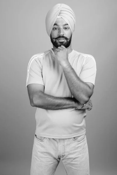 Studio Shot Young Handsome Bearded Indian Sikh Man Wearing Turban — Zdjęcie stockowe
