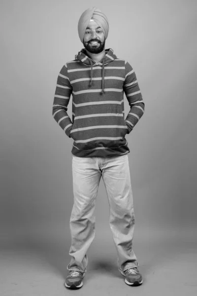 Studio Shot Young Handsome Bearded Indian Sikh Man Wearing Turban — Fotografia de Stock