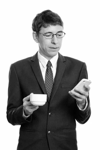 Studioaufnahme Eines Geschäftsmannes Anzug Isoliert Vor Weißem Hintergrund Schwarz Weiß — Stockfoto