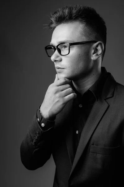 Studio Shot Young Handsome Businessman Wearing Suit Gray Background Black — Stock Photo, Image