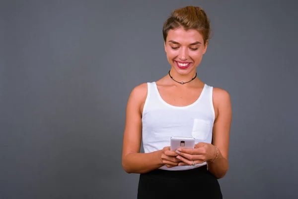 Studio Shot Young Beautiful Businesswoman Blond Hair Using Mobile Phone — Stock Photo, Image