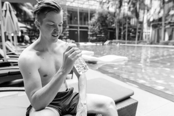 Portrait Young Handsome Man Relaxing Swimming Pool Hotel Black White — Zdjęcie stockowe