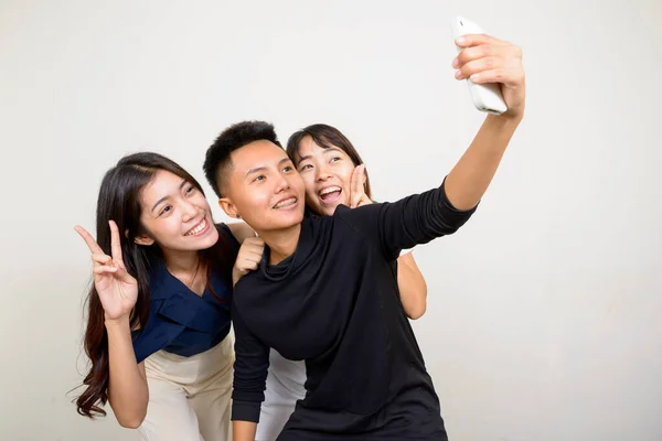 Studio Shot Three Young Beautiful Asian Women Friends Together White — Zdjęcie stockowe