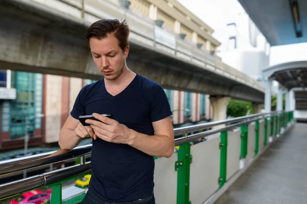 Portrait Young Handsome Man Sky Train Station City Outdoors — Φωτογραφία Αρχείου