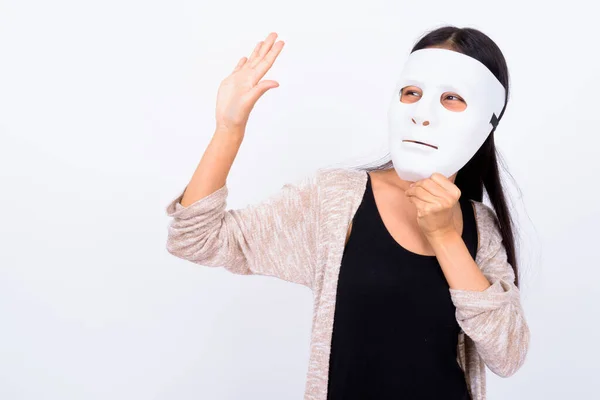 Portrait of young beautiful Asian woman with mask — Stock Photo, Image