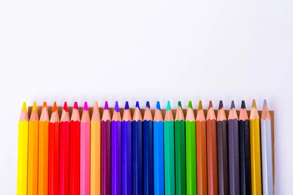 Top View Colored Wooden Pencils Row — Stock Photo, Image