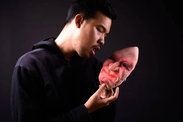 Studio Shot Young Asian Man Hoodie Horror Mask Black Background — Fotografia de Stock