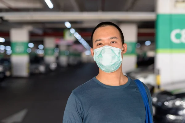 Portrait Young Asian Man Mask Protection Corona Virus Outbreak Parking — Stock Fotó