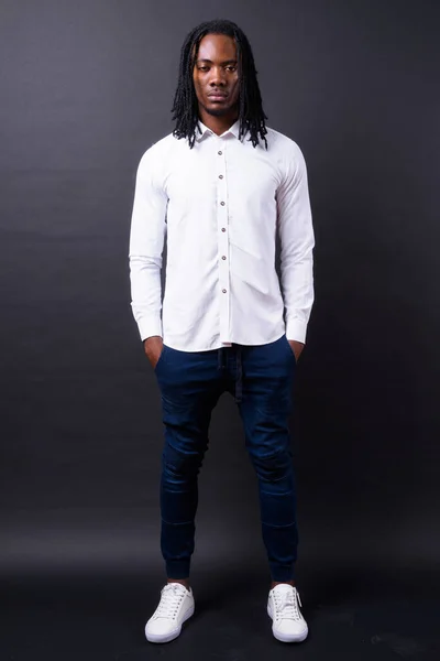 Studio Shot Young Handsome African Businessman Dreadlocks Black Background — Stockfoto