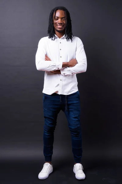 Studio Shot Young Handsome African Businessman Dreadlocks Black Background — Stockfoto