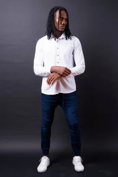 Studio Shot Young Handsome African Businessman Dreadlocks Black Background — Stock fotografie