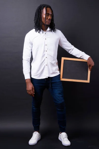 Studio Shot Young Handsome African Businessman Dreadlocks Black Background — Stock Fotó