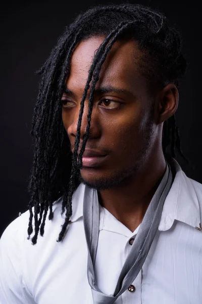 Studio Shot Young Handsome African Businessman Dreadlocks Black Background — Stok fotoğraf
