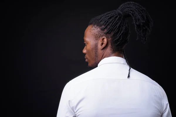 Studio Shot Young Handsome African Businessman Dreadlocks Black Background — Stockfoto