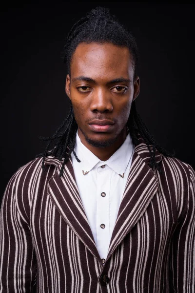 Studio Shot Young Handsome African Businessman Dreadlocks Black Background — Stock fotografie