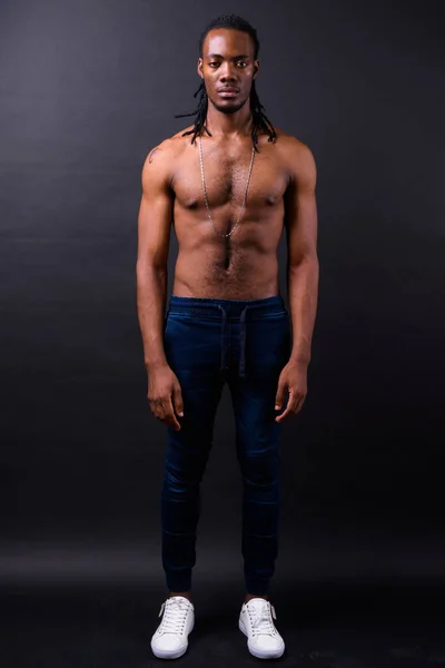 Studio Shot Young Handsome African Man Dreadlocks Shirtless Black Background — Stok fotoğraf