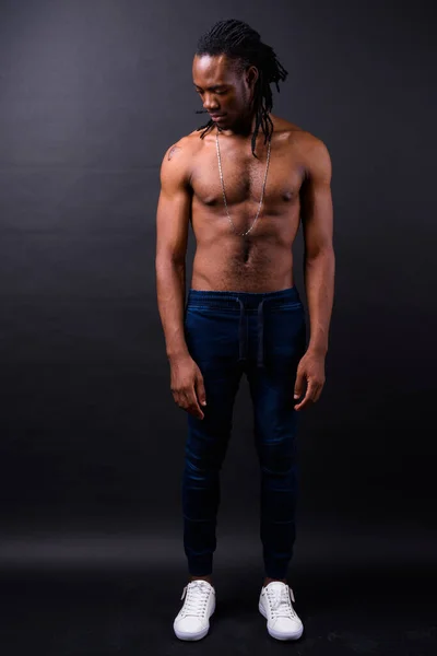 Studio Shot Young Handsome African Man Dreadlocks Shirtless Black Background — Stockfoto