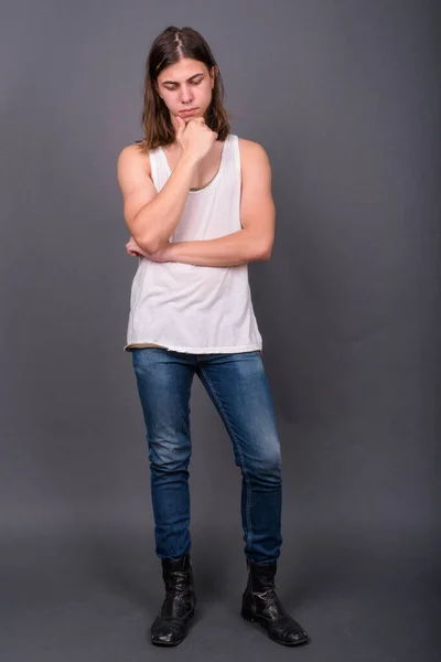 Studio Shot Young Handsome Androgynous Man Long Hair Gray Background — Fotografia de Stock