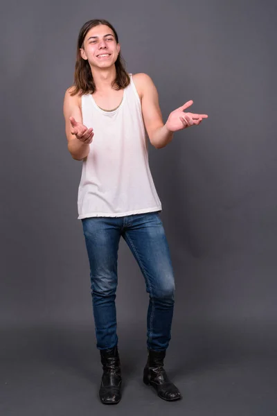 Studio Shot Young Handsome Androgynous Man Long Hair Gray Background — Fotografia de Stock