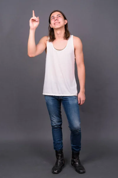 Studio Shot Young Handsome Androgynous Man Long Hair Gray Background — Stok fotoğraf