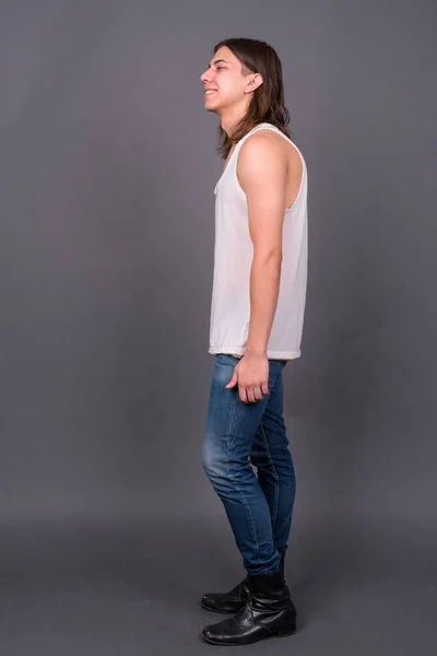 Studio Shot Young Handsome Androgynous Man Long Hair Gray Background — Stock fotografie