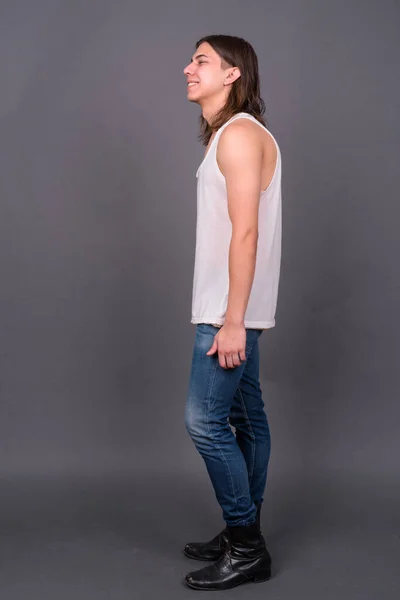 Studio Shot Young Handsome Androgynous Man Long Hair Gray Background — Fotografia de Stock