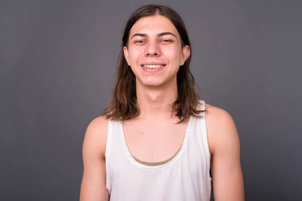 Studio Shot Young Handsome Androgynous Man Long Hair Gray Background — Stock Fotó