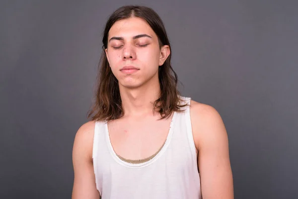 Studio Shot Young Handsome Androgynous Man Long Hair Gray Background — Stock Photo, Image