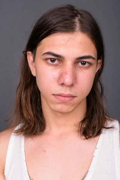 Studio Shot Young Handsome Androgynous Man Long Hair Gray Background — Stock Fotó