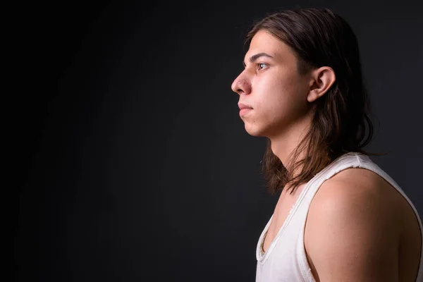 Studio Shot Young Handsome Androgynous Man Long Hair Gray Background — Stok Foto