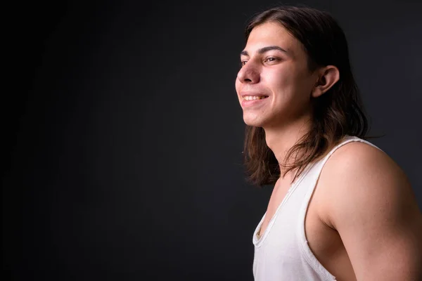 Studio Shot Young Handsome Androgynous Man Long Hair Gray Background — Stockfoto