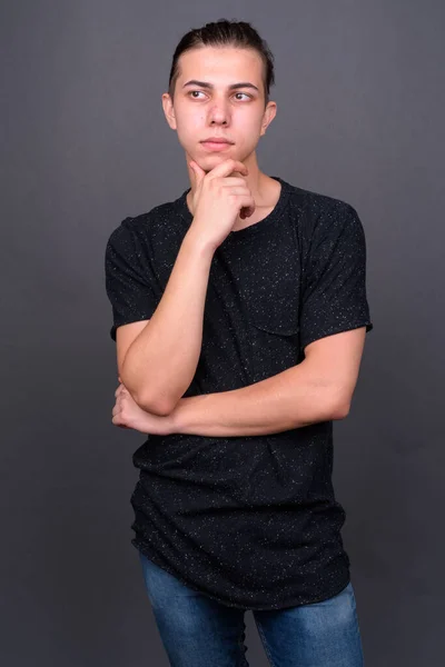 Studio Shot Young Handsome Androgynous Man Long Hair Gray Background — Stock fotografie