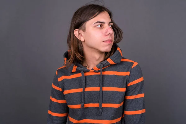 Studio Shot Young Handsome Androgynous Man Long Hair Wearing Hoodie — Stok Foto