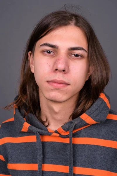 Studio Shot Young Handsome Androgynous Man Long Hair Wearing Hoodie — Stockfoto