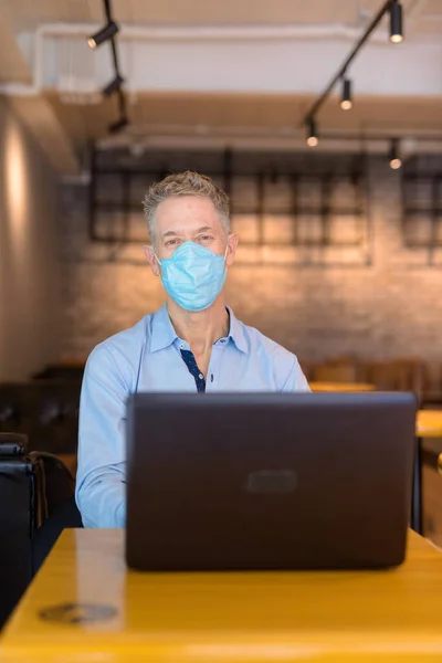 Portrait Mature Businessman Mask Protection Corona Virus Outbreak Sitting Coffee — Stock Fotó