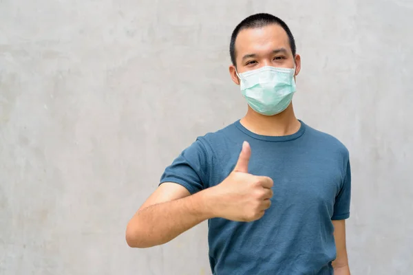 Portrait Young Asian Man Mask Protection Corona Virus Outbreak Concrete — Photo