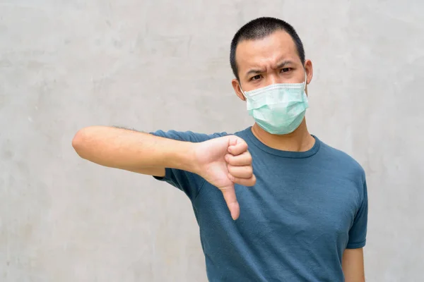 Portrait Young Asian Man Mask Protection Corona Virus Outbreak Concrete — Photo