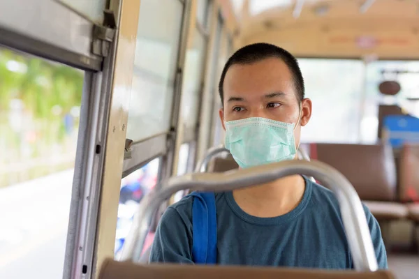 Portrait Young Asian Man Mask Protection Corona Virus Outbreak Riding — Stock Fotó