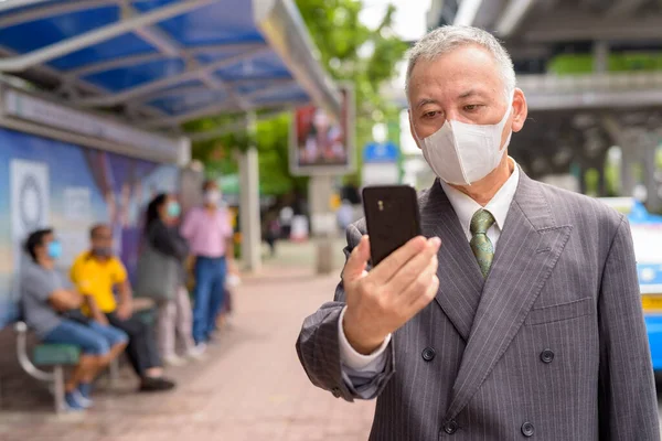 Portrait Mature Japanese Businessman Mask Protection Corona Virus Outbreak Bus — Stock Fotó