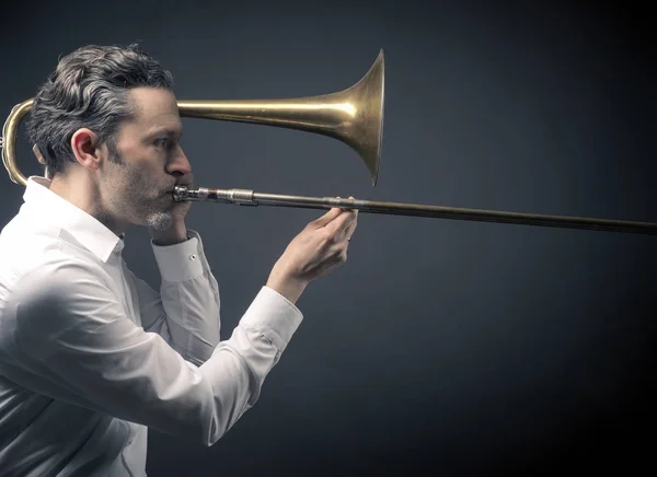 Musician with a trombone — Stock Photo, Image