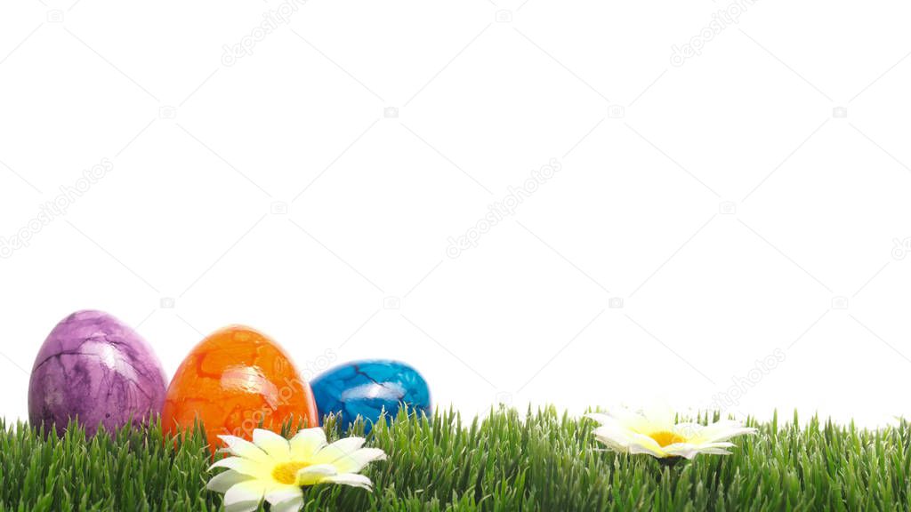 Three colored Easter eggs ob white