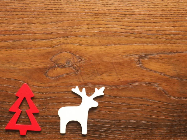 Ağaç ve Ren geyiği ile Noel kartı