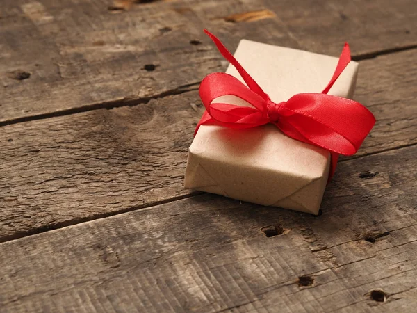 Gift box with a red bow — Stock Photo, Image